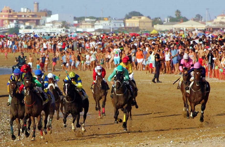 Carrera de caballos en la playa de Sanlúcar de Barrameda